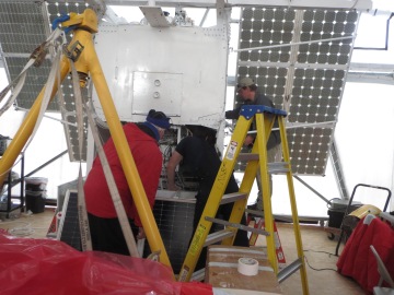 Chris, our payload engineer, getting his stuff all ready to go with help from Bobby and Mike (all from CSBF)